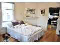 this-fine-studio-is-located-in-an-old-historic-masion-small-0